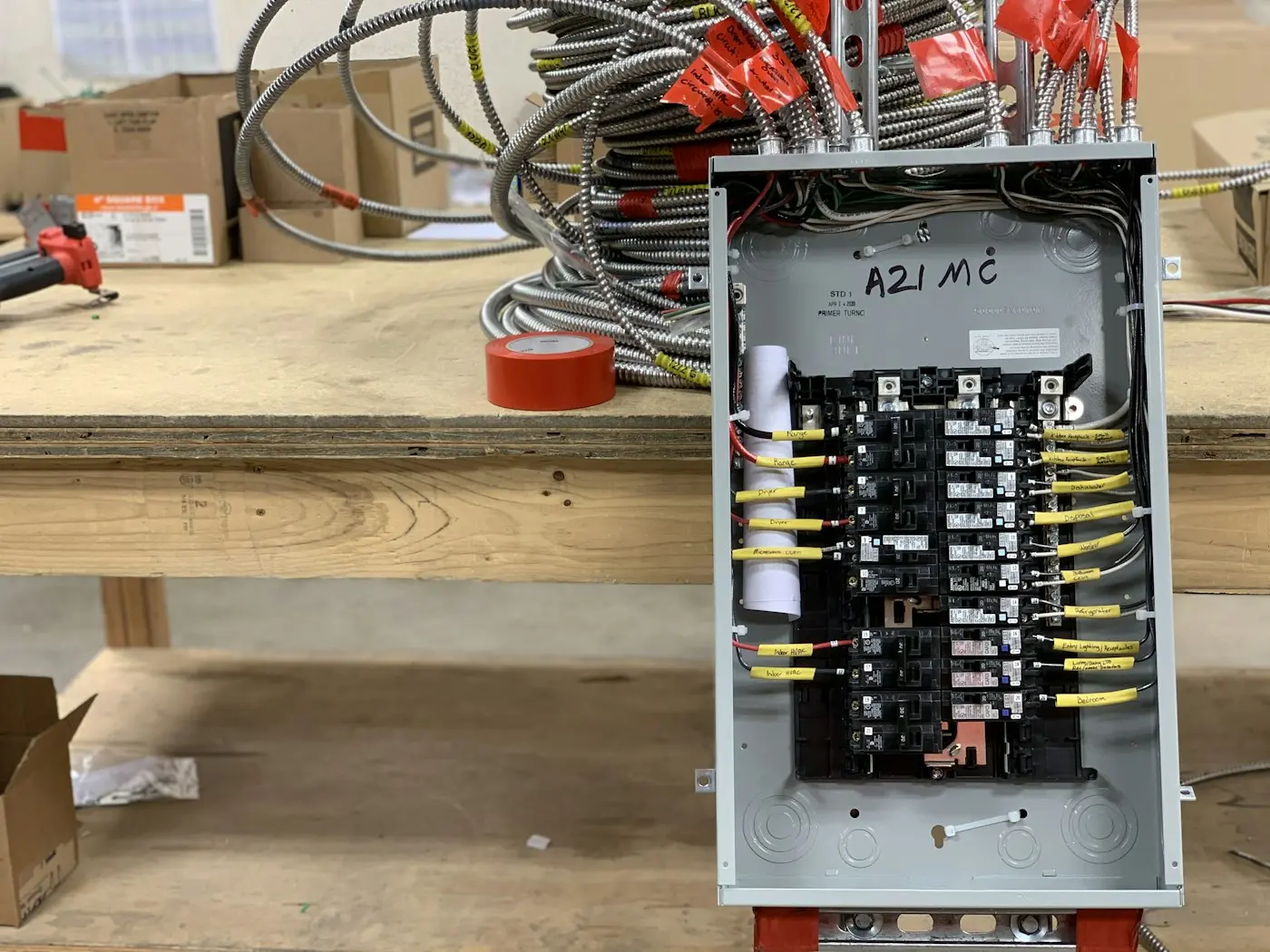 Open electrical breaker panel with neatly labeled circuits and wiring